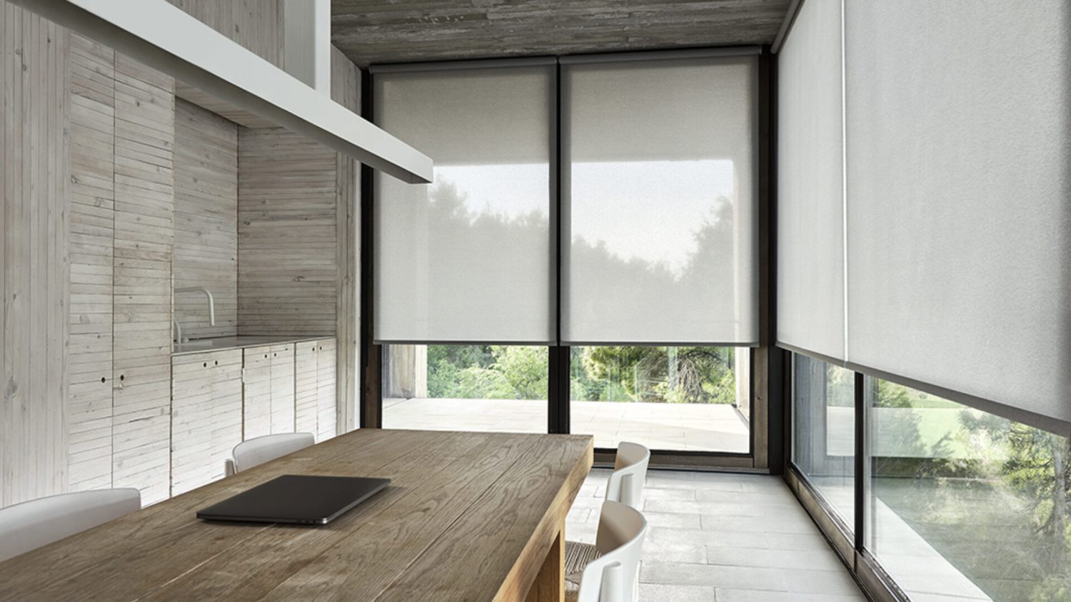 Sunscreen roller blinds are designed to manage heat and glare.